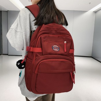 Large-capacity schoolbag female Korean version versatile high school student college student solid color backpack commuting forest style junior high school student backpack