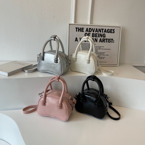 High-end textured small bag for women spring and summer 2024 new niche design single shoulder crossbody bag solid color portable shell bag