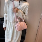 High-end textured small bag for women spring and summer 2024 new niche design single shoulder crossbody bag solid color portable shell bag