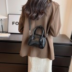 High-end textured small bag for women spring and summer 2024 new niche design single shoulder crossbody bag solid color portable shell bag